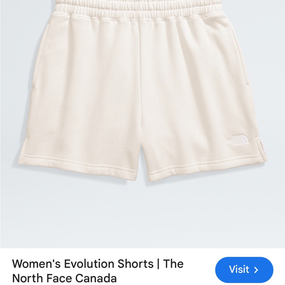 Cream High-Waisted North Face Athletic Shorts